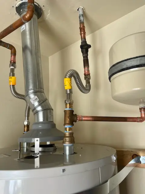 Water heater installation and plumbing repair in Spotswood Manor